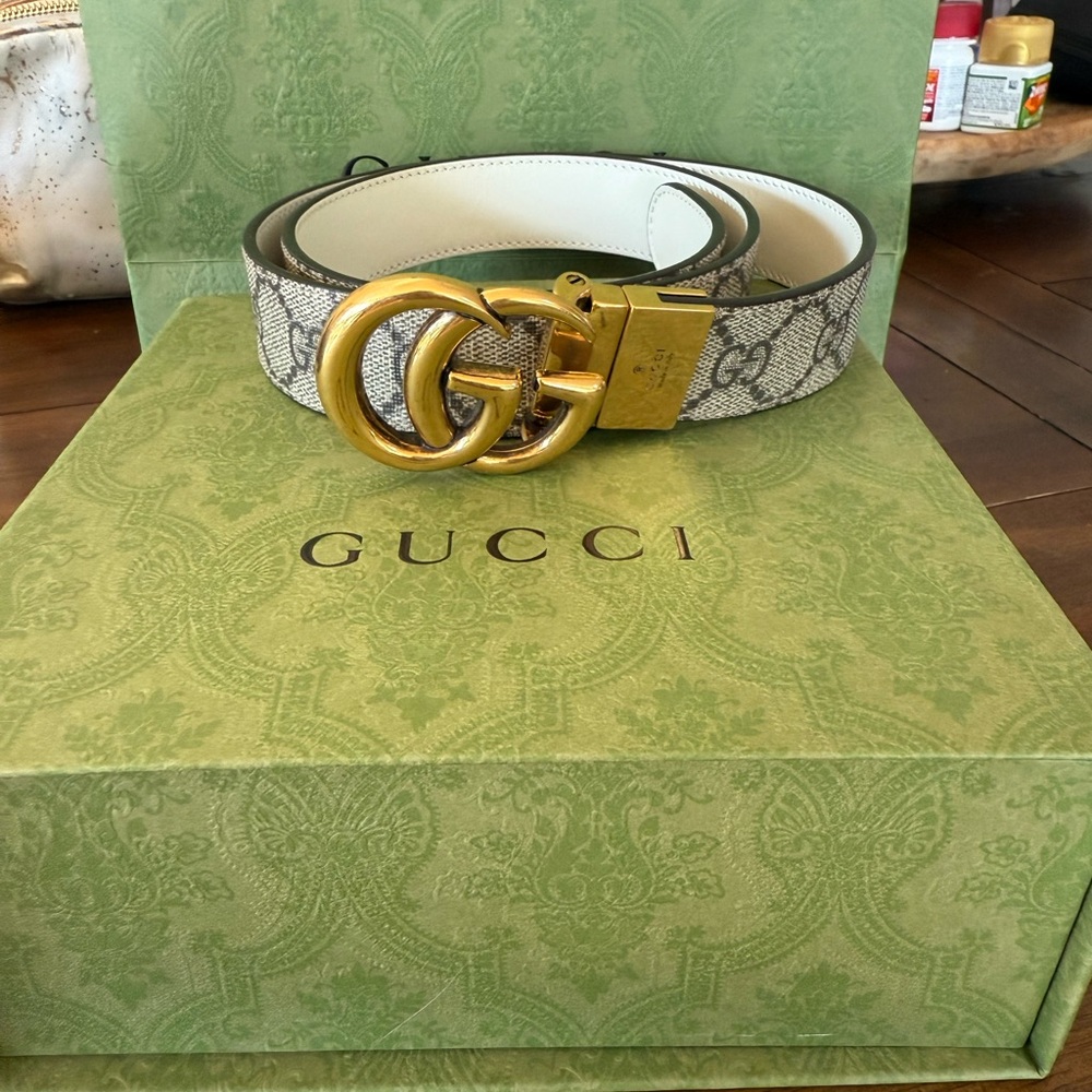 Gucci Women's Gold Buckle Belt with Gray Pattern
